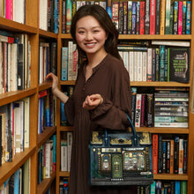Load image into Gallery viewer, Between the Covers Bookbinder Ruby Backpack