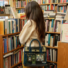 Load image into Gallery viewer, Between the Covers Bookbinder Ruby Backpack