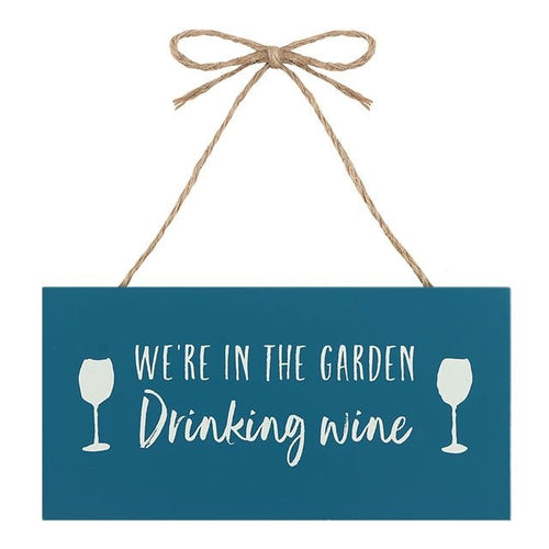 'Were in the garden drinking wine' Plaque
